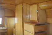 Photo of beautiful cabinets and woodwork in 1948 Westcraft Westwood trailer